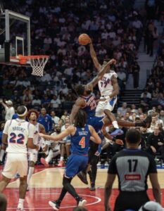 PHOTO VJ Edgecombe Flying Over A Defender Still Shot