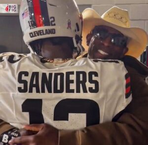 PHOTO Deion Sanders Hugging Shedeur After The Win