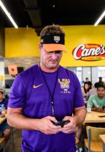 PHOTO Lane Kiffin Already In An LSU Shirt And Hat