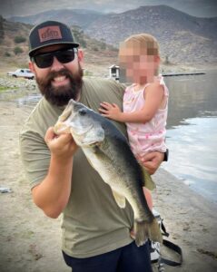PHOTO Michael Duarte Catching Fish With His Daughter