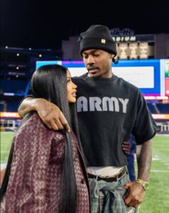 PHOTO Stefon Diggs Hugging Cardi B On Gillette Stadium Field