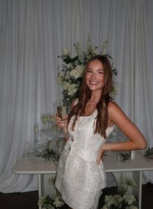 PHOTO Tucker Kraft's Wife Drinking Wine In Expensive White Dress