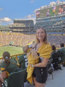 PHOTO Tucker Kraft's Wife Looking Hot AF At Packers Game While Holding Her Daughter
