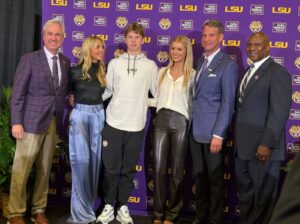 PHOTO Landry Kiffin Steals The Show In Lane Kiffin LSU Family Picture After Press Conference
