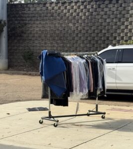 PHOTO Lane Kiffin's Clothes Rack In His Office Of Dress Shirts Got Sent To The Street And Were Thrown Out Of His Office