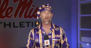 PHOTO Marty Smith Of ESPN Decked Out In LSU Santa Hat And LSU Tigers Polo Shirt