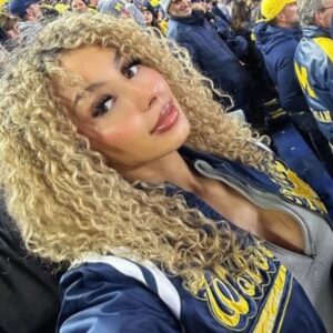 PHOTO Mia Sorety Wearing A Wolvernies Jacket At Michigan Home Game