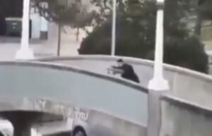 PHOTO Of Gunman Opening Fire From Atop A Bridge On Bondi Beach