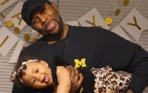 PHOTO Sherrone Moore Holding One Of His Kids One Their Birthday
