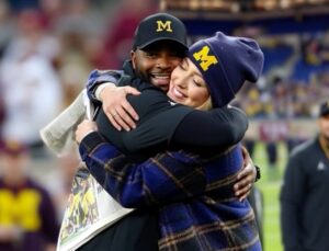 PHOTO Sherrone Moore Hugging Paige Shiver