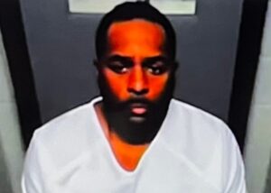 PHOTO Sherrone Moore Looks Like Refugee Waiting To Be Let Out Of A Cage During His Court Appearance