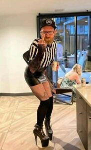 PHOTO Alex Pretti Wearing A Dress And Heels While Flipping Off The Camera