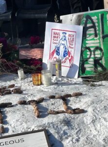 PHOTO Alex Pretti's Friend Left Carboard Sign With Rewritten Hail Mary On It For Him