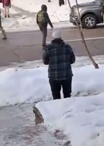 PHOTO Renee Nicole Good Wearing Flannel Shirt While ICE Officers Were Being Blocked