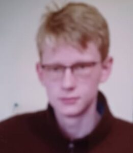 PHOTO Austin Tucker Martin Mugshot With Glasses