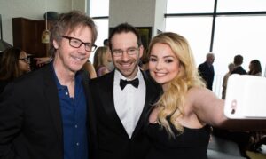 PHOTO Leonid Radvinsky Posing With A Blonde Star