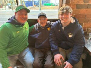 PHOTO Marc Edwards And His Son Xander At CFB Playoff National Championship With Lou Holtz In Miami