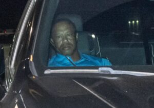PHOTO Tiger Woods Unamused Taking A Nap In Passenger Seat After Getting Picked Up From Martin County Jail