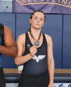 PHOTO Cain Clark With His Wrestling Awards And His Face Not Blurred Out