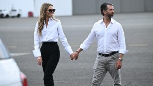 PHOTO Donald Trump Jr Walking To The Car With Bettina Anderson