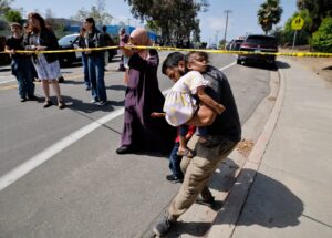 PHOTO Father Taking Away His Daughter That Was Shot Dead By San Diego Mosque Shooters