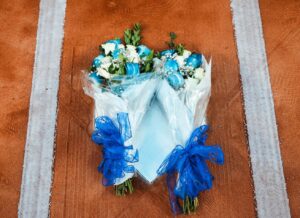 PHOTO Flowers At Home Plate For John Sterling