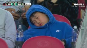 PHOTO Kid Half Asleep During Jordan World Cup Game In San Francisco