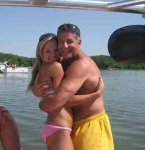 PHOTO Bruce Pearl Boat Day On The Lake With His Wife In A Bikini